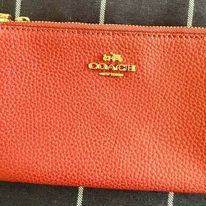 Coach burgandy wristlet… brand new!!